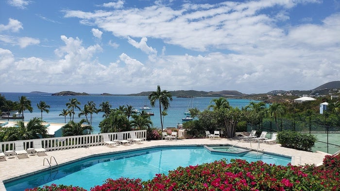 The view from the pool overlooking the bay at Secret Harbour Beach Resort in St. Thomas. The view from the pool overlooking the bay at Secret Harbour Beach Resort in St. Thomas.
