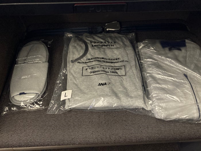 ANA new first class suites HND SFO Boeing 777 pajamas slippers