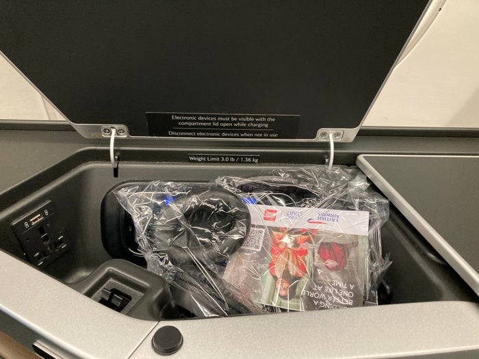 British Airways A350 1000 Club Suites review LAS LHR arm rest bin with headphones 