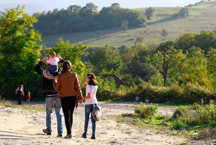 Family Walking on Vacation Family Walking on Vacation