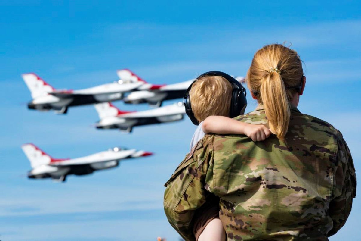 Female Military Member with Child 1