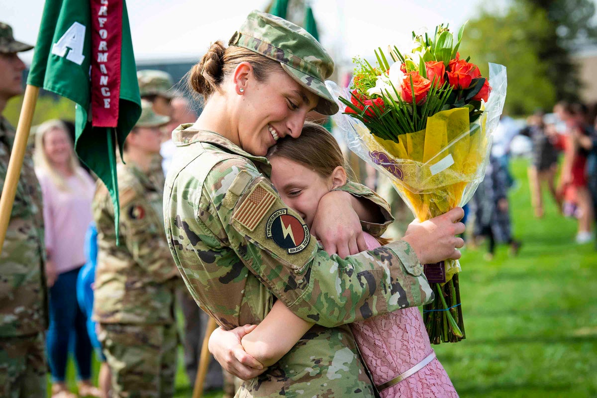 Female Military Member with Child