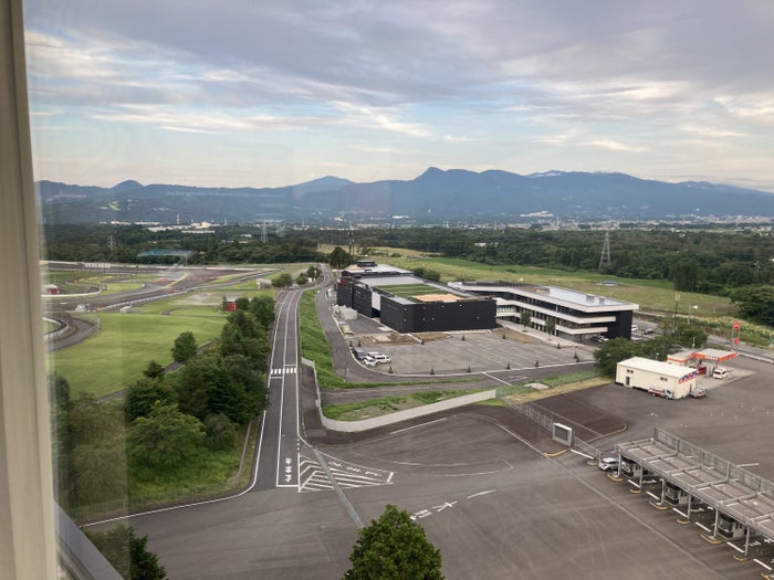 Fuji Speedway Hotel Grand Prix Corner King Suite bedroom view of speedway Fuji Speedway Hotel Grand Prix Corner King Suite bedroom view of speedway
