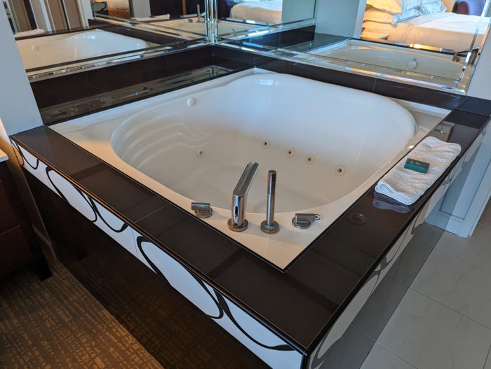Hilton Grand Vacations Elara Las Vegas bedroom jacuzzi tub Hilton Grand Vacations Elara Las Vegas bedroom jacuzzi tub