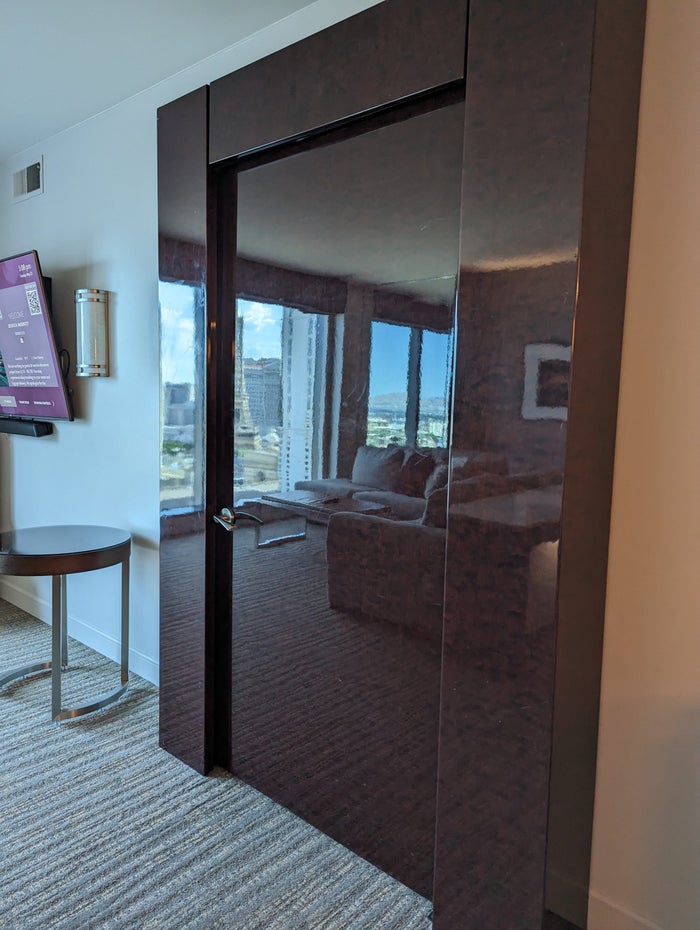 Hilton Grand Vacations Elara Las Vegas living room door to bedroom Hilton Grand Vacations Elara Las Vegas living room door to bedroom