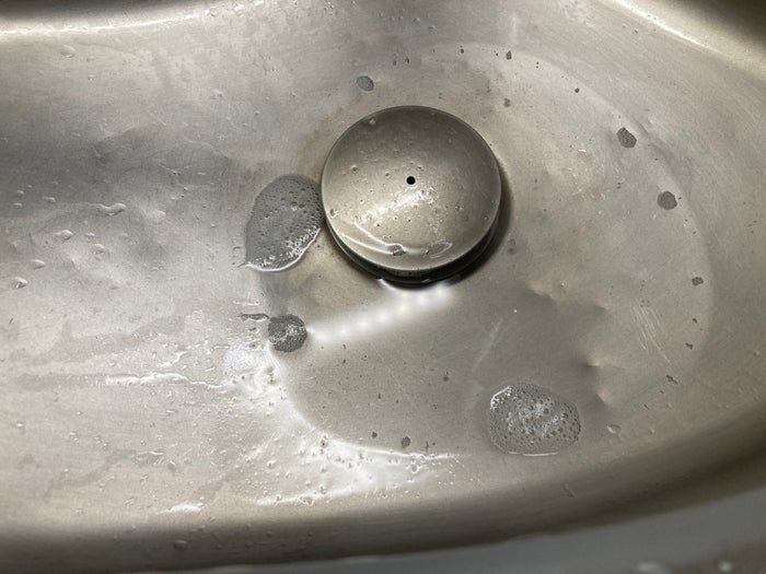 Royal Air Maroc Boeing 737 MAX 8 business class LHR CMN bathroom sink with water Royal Air Maroc Boeing 737 MAX 8 business class LHR CMN bathroom sink with water