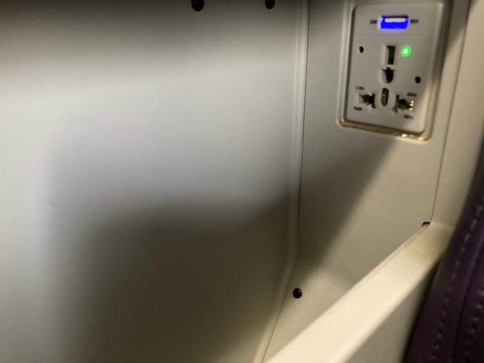 Royal Air Maroc Boeing 737 MAX 8 business class LHR CMN outlet in middle arm rest Royal Air Maroc Boeing 737 MAX 8 business class LHR CMN outlet in middle arm rest