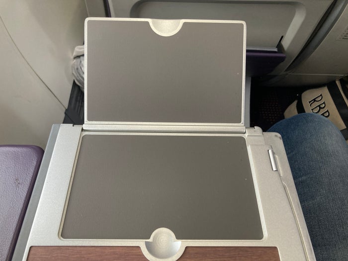Royal Air Maroc Boeing 737 MAX 8 business class LHR CMN tray table unfolded front Royal Air Maroc Boeing 737 MAX 8 business class LHR CMN tray table unfolded front