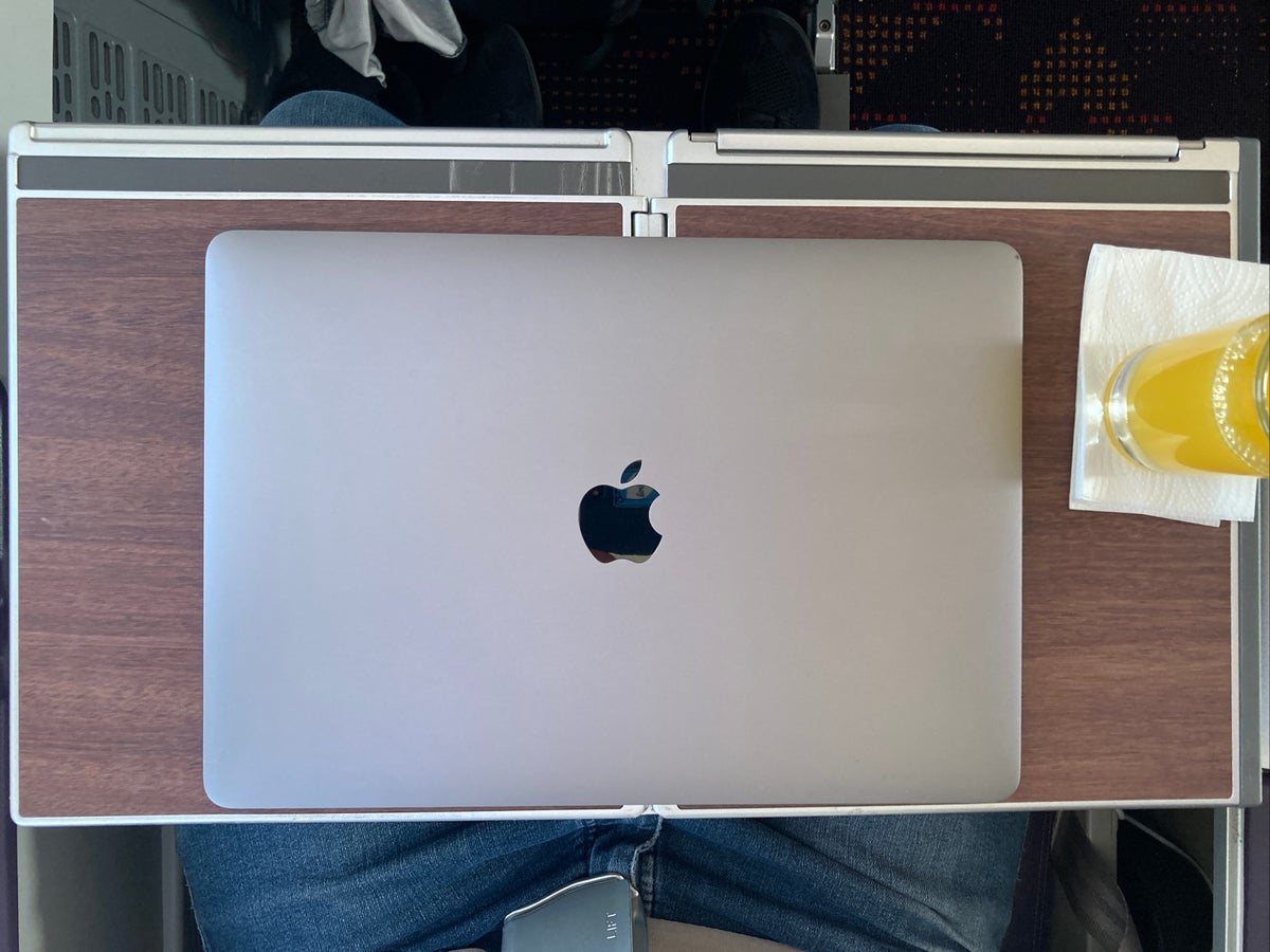 Royal Air Maroc Boeing 737 MAX 8 business class LHR CMN tray table unfolded with laptop