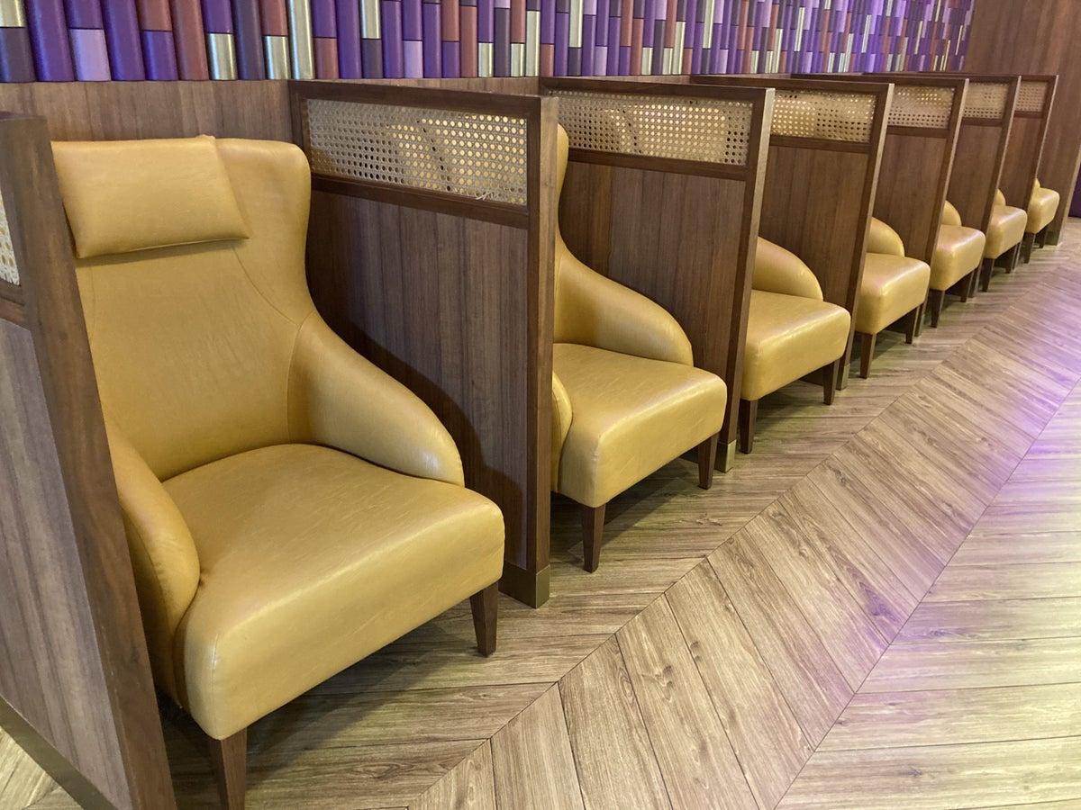 Royal Orchid Lounge HKT Domestic yellow chairs