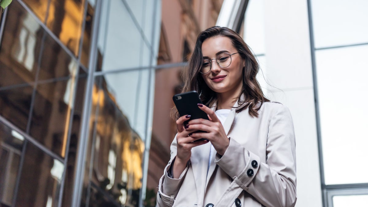 Smiling woman on cell phone