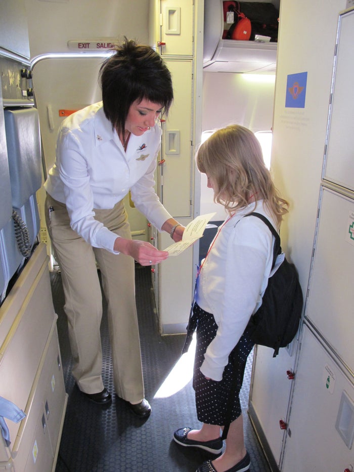 Child and tablet at airport Southwest unaccompanied minor
