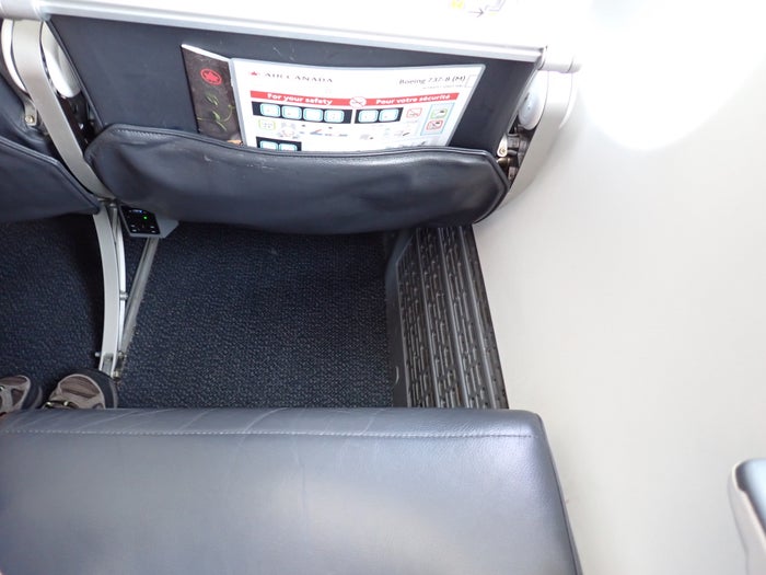 AC707 Seat 24F footwell