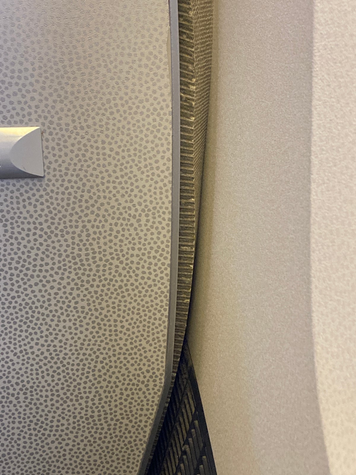 Air France Boeing 777 200 CDG JFK premium economy loose insulation around lavatory