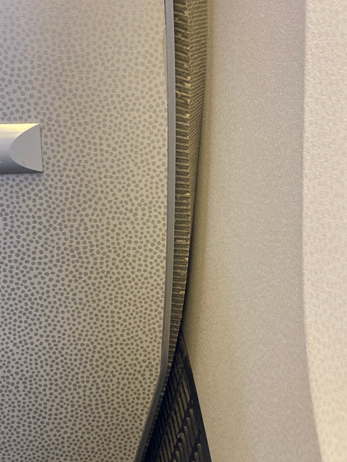 Air France Boeing 777 200 CDG JFK premium economy loose insulation around lavatory Air France Boeing 777 200 CDG JFK premium economy loose insulation around lavatory