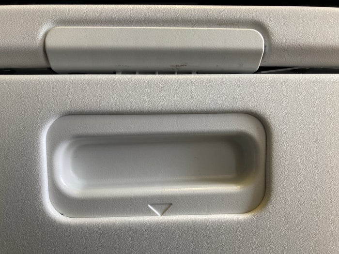 Air France Boeing 777 200 CDG JFK premium economy tray table latch Air France Boeing 777 200 CDG JFK premium economy tray table latch