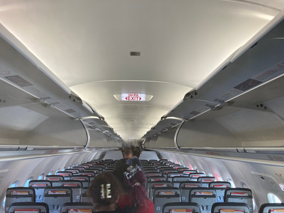 Avianca economy A320 LAX SAL overhead bins and seats disembarking