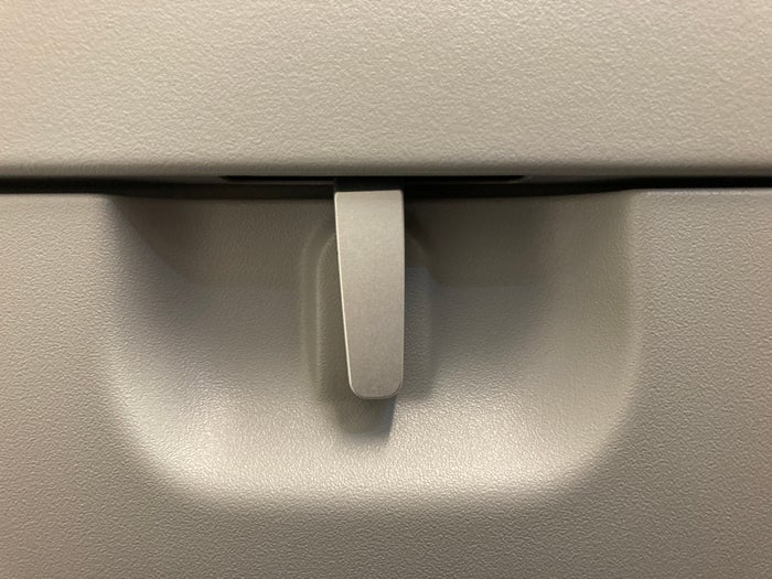 Avianca economy A320 LAX SAL tray table latch