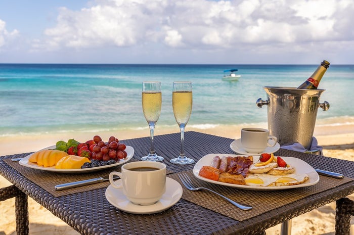 Beachfront dining at The House by Elegant Hotels