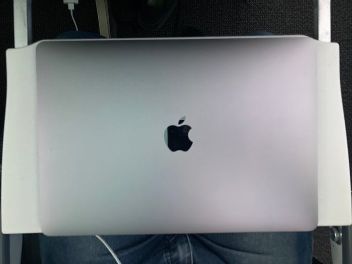 Air Canada B787-9 FRA to YUL economy tray table with laptop
