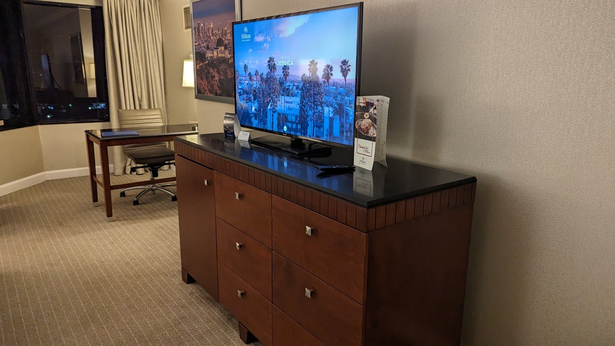 Hilton Los Angeles Universal City room dresser TV and desk with chair