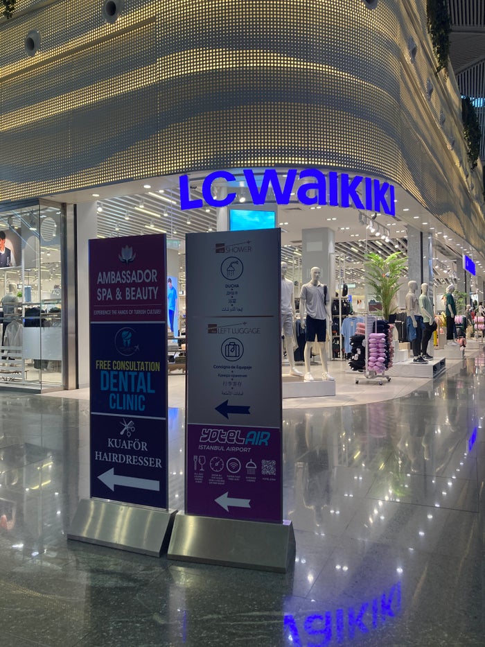 IGA Lounge IST signs near duty free IGA Lounge IST signs near duty free