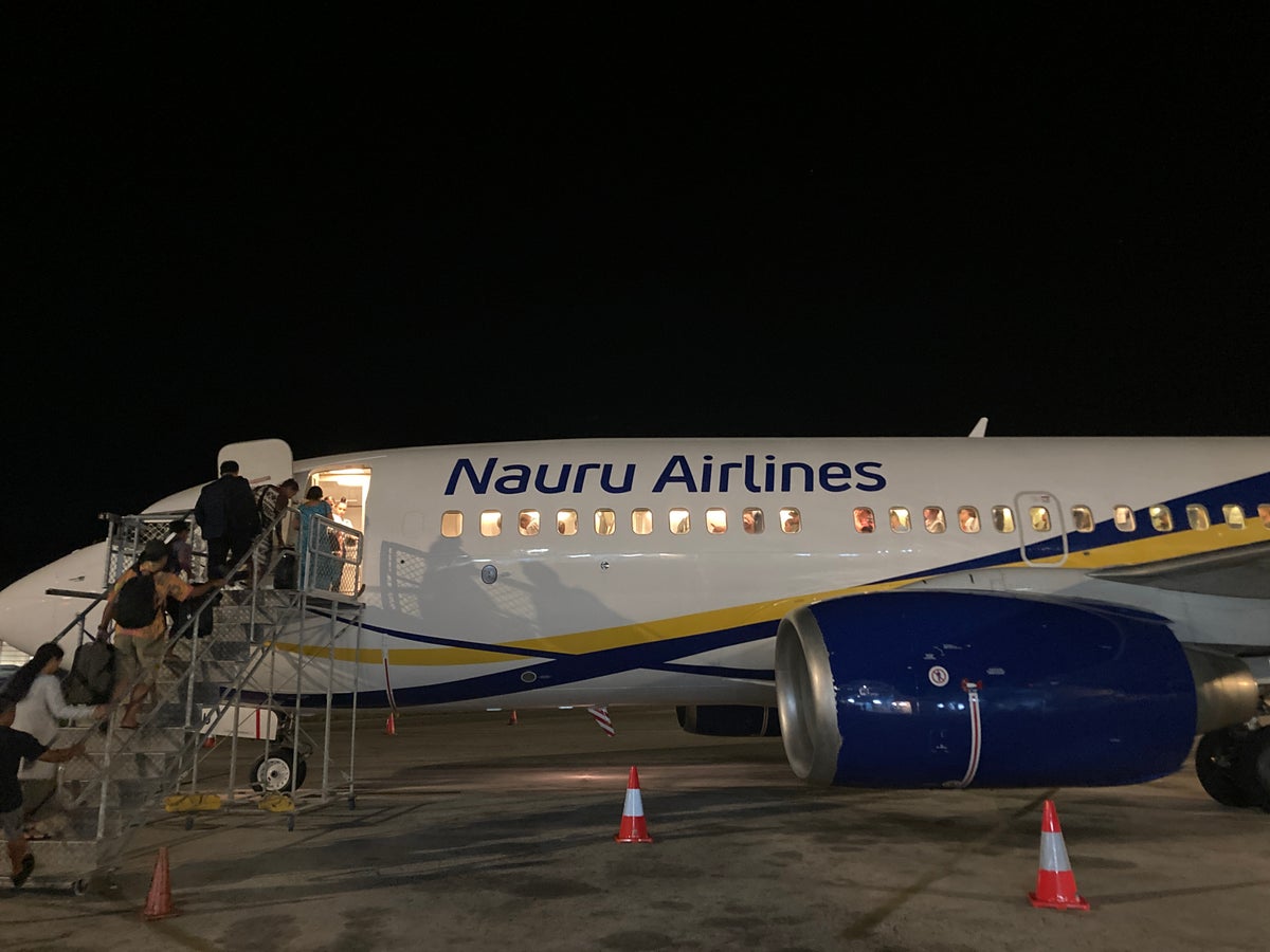 Nauru Airlines boarding by steps at INU