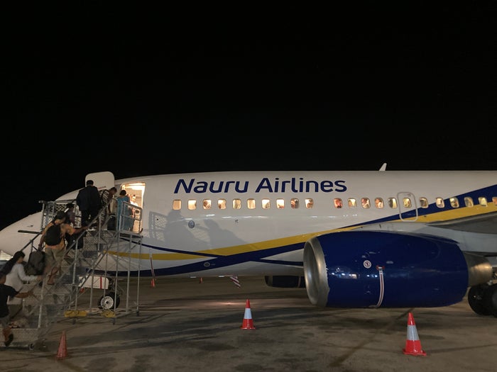 Nauru Airlines boarding by steps at INU Nauru Airlines boarding by steps at INU