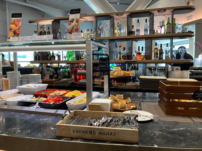 Plaza Premium Lounge Rome FCO salad bar and bar