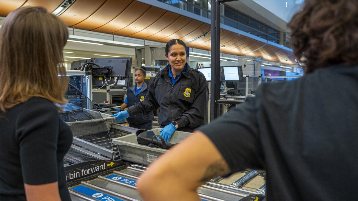 TSA officer at screening