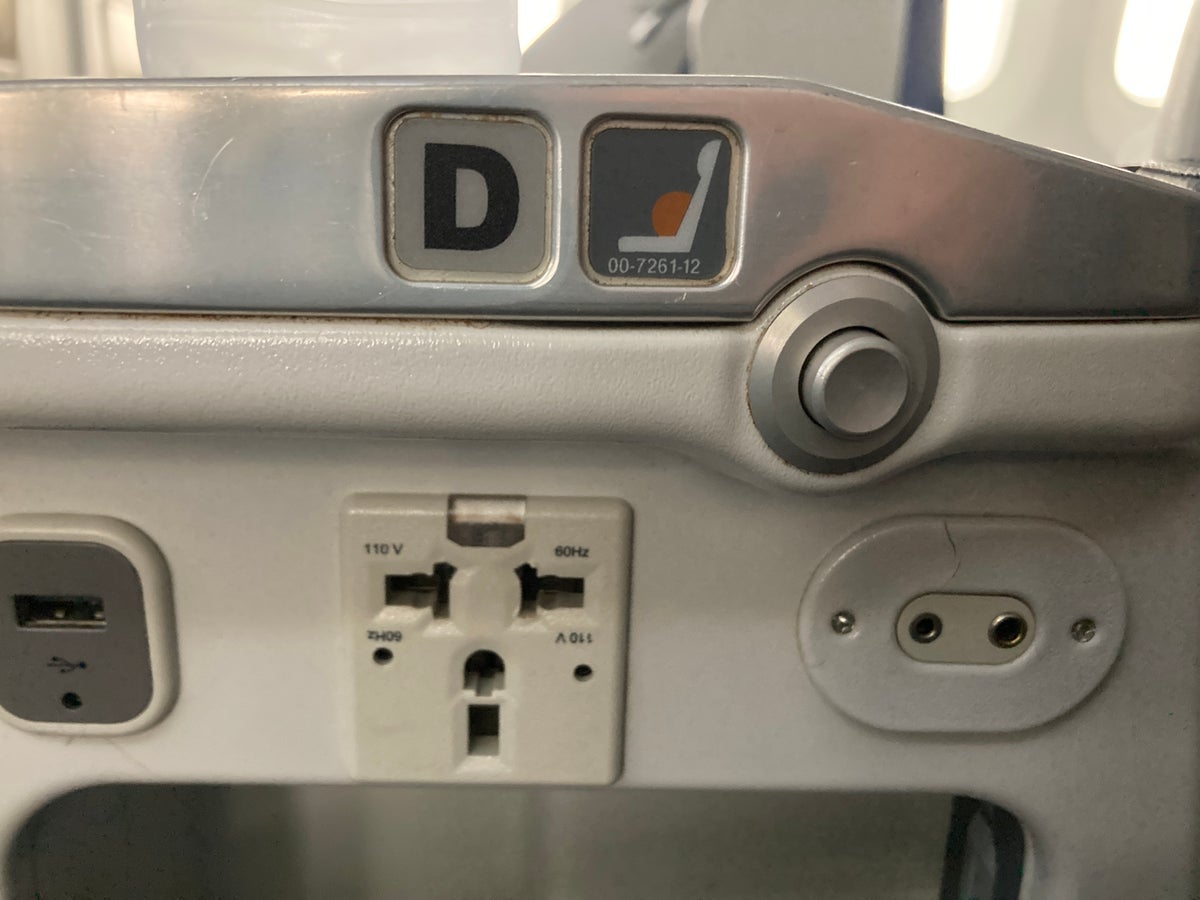 ANA B787 8 business class seat outlets and recline button