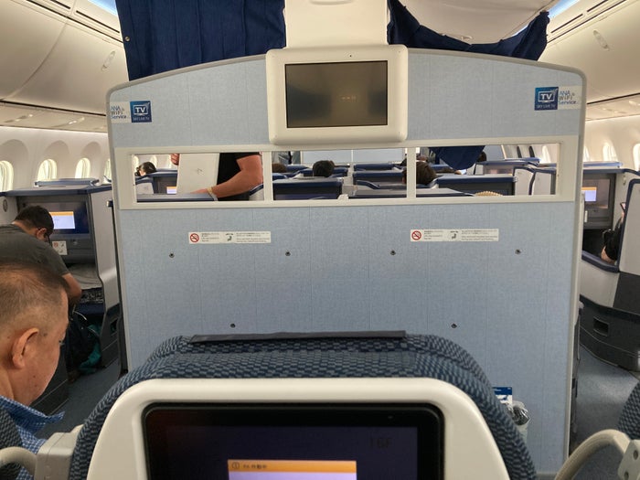ANA premium economy Boeing 787 divider to business class ANA premium economy Boeing 787 divider to business class