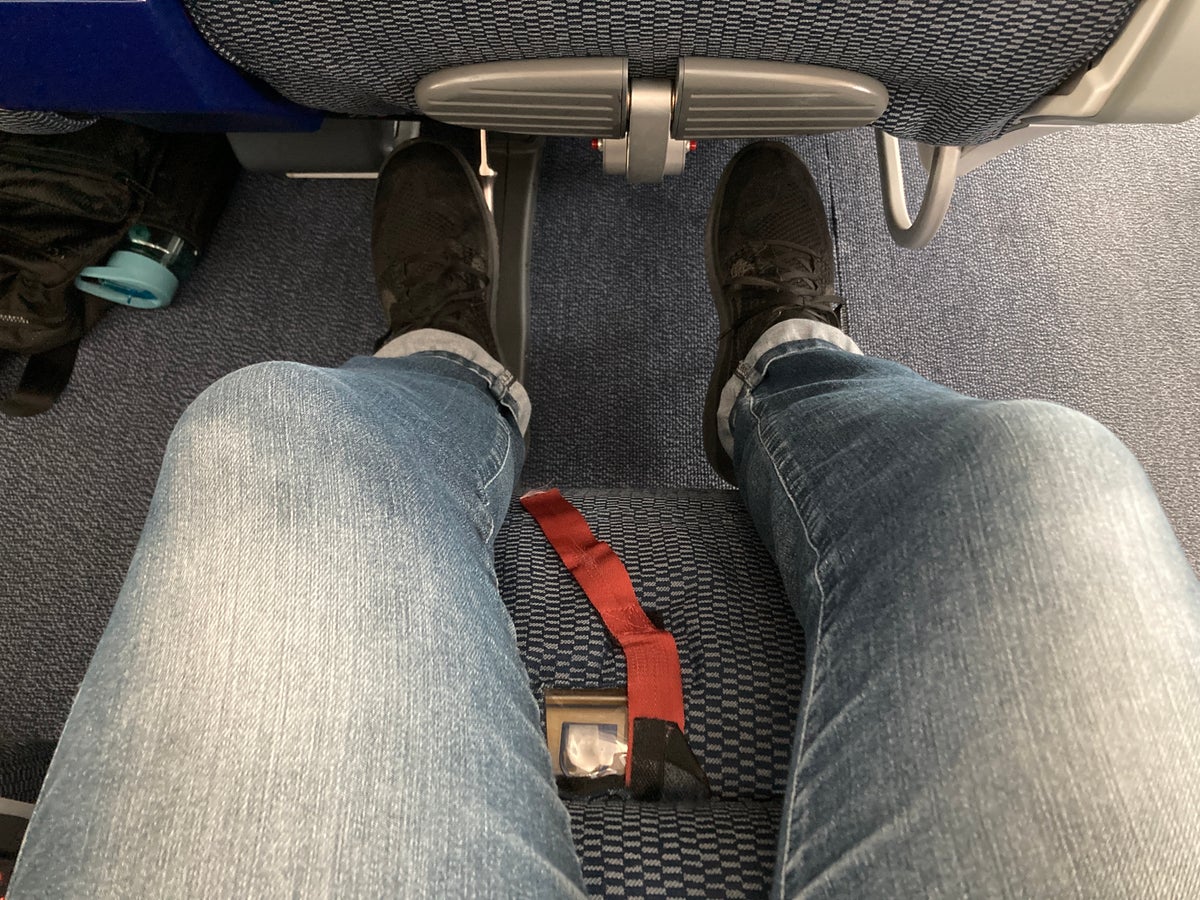 ANA premium economy Boeing 787 using leg rest