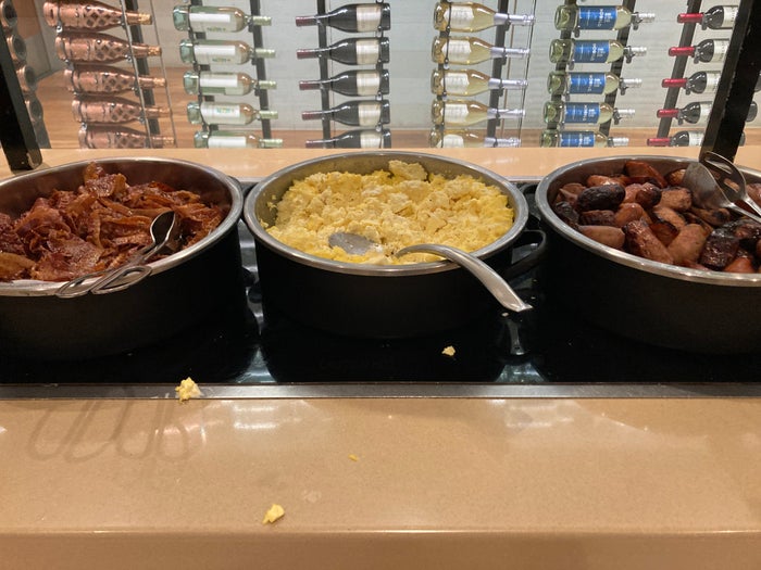 ANA premium economy Star Alliance lounge LAX hot food bar ANA premium economy Star Alliance lounge LAX hot food bar