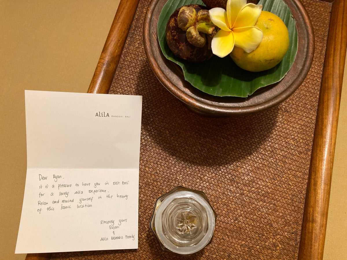 Alila Manggis Bali bedroom welcome snacks and note