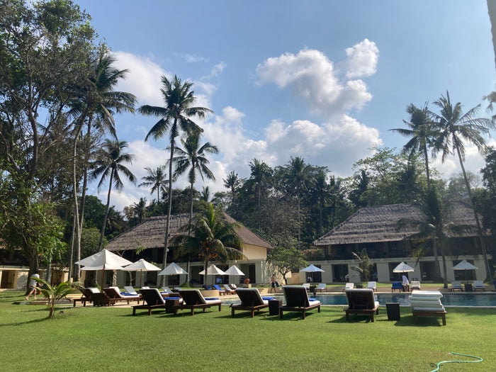 Alila Manggis Bali pool with lounge chairs Alila Manggis Bali pool with lounge chairs