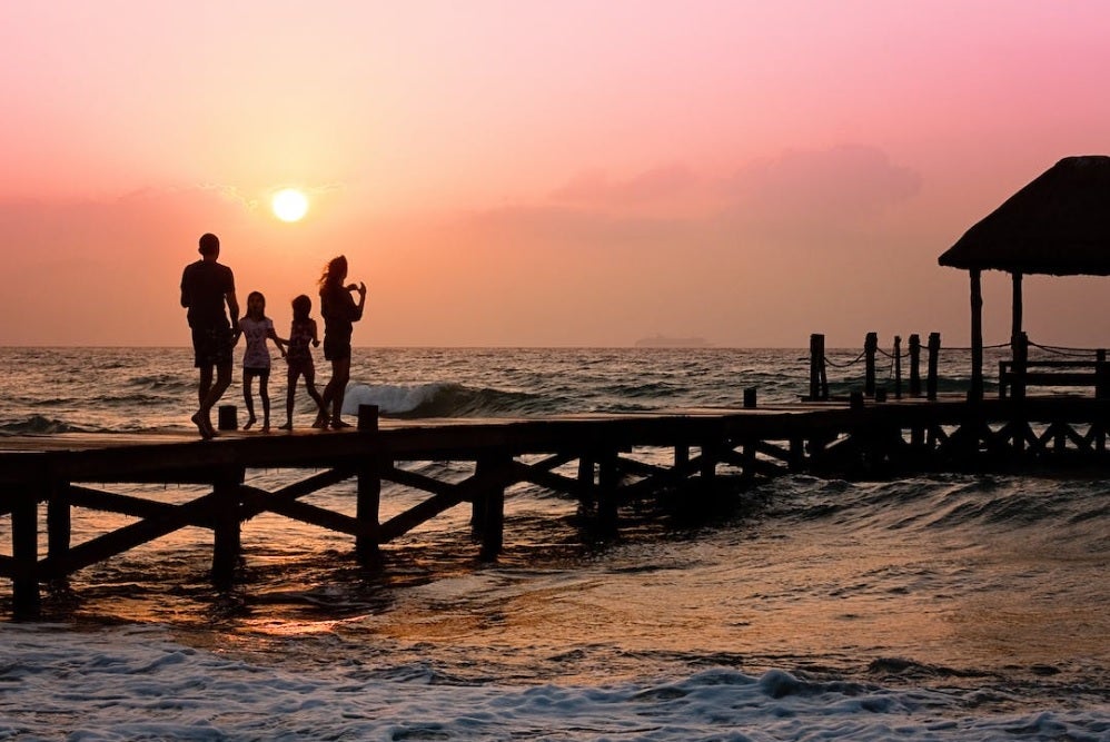 Family on Pier at Sunset