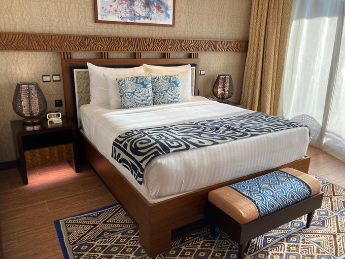 Lapita Dubai Parks and Resorts Autograph Collection junior suite bed nightstand