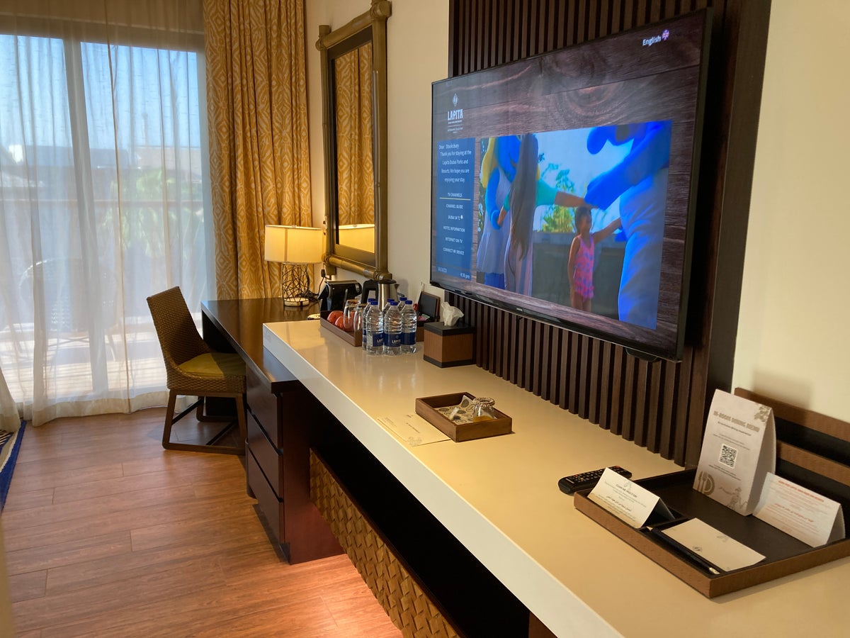 Lapita Dubai Parks and Resorts Autograph Collection junior suite living room desk tv