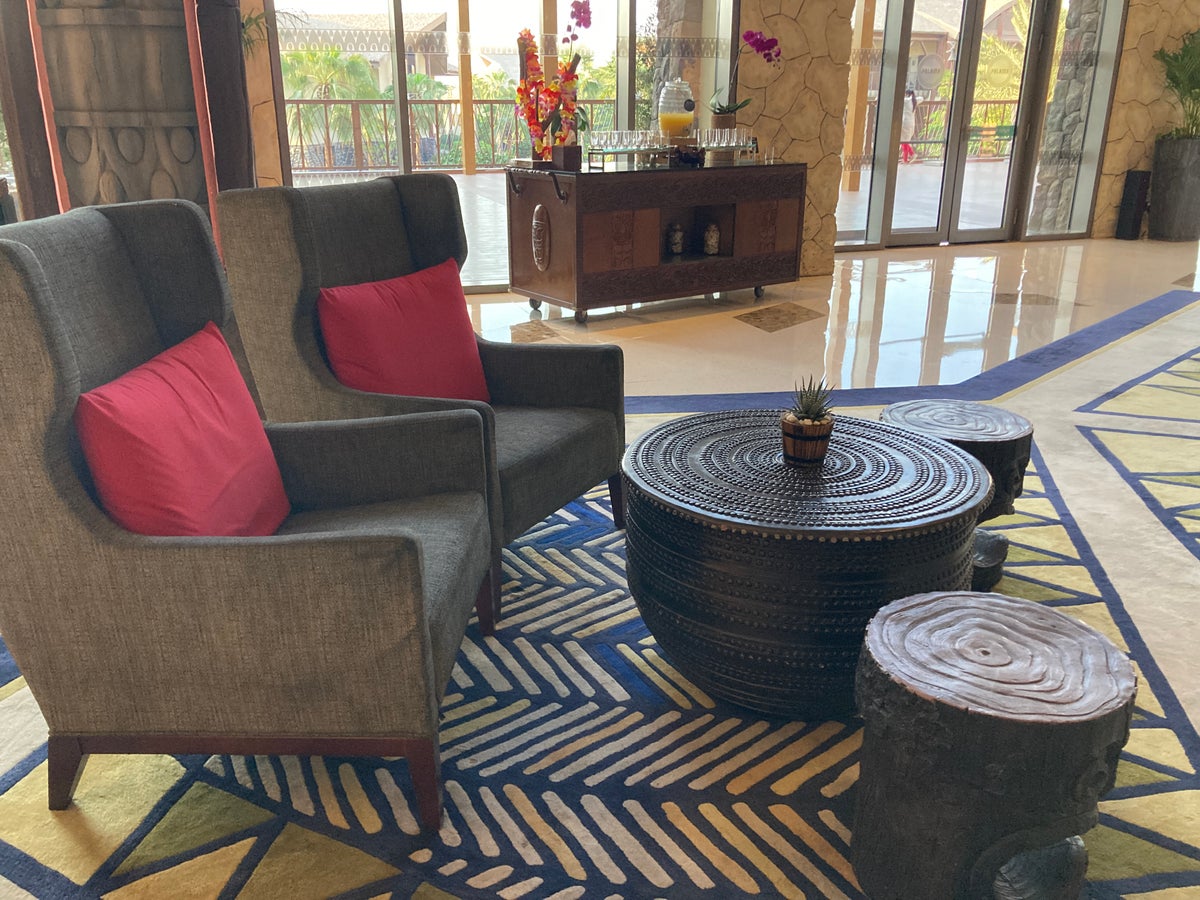 Lapita Dubai Parks and Resorts Autograph Collection lobby chairs drinks