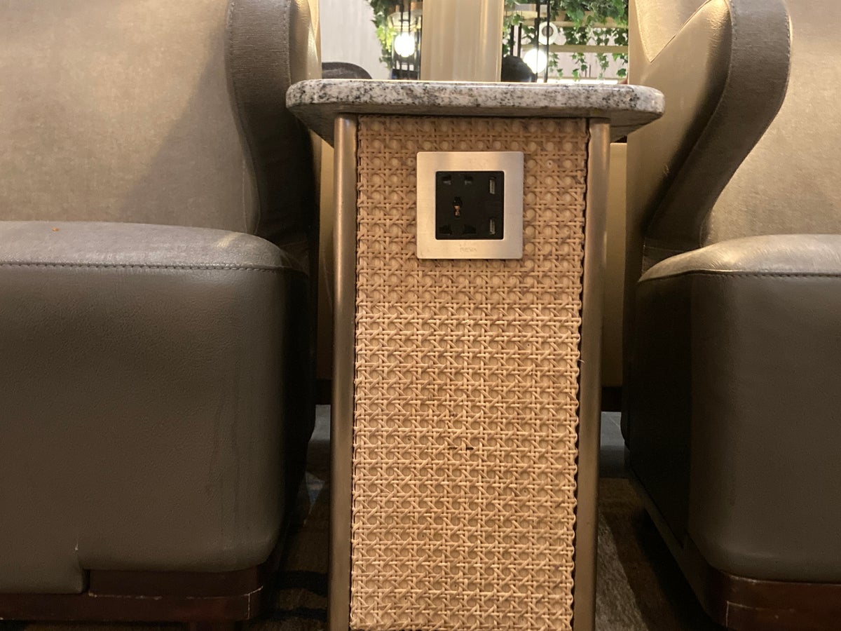 Saphire Plaza Premium Lounge plug between seats at CGK