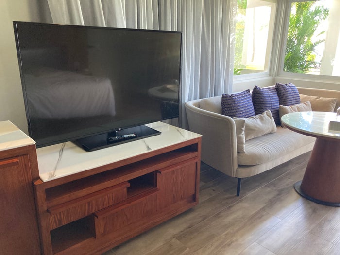 Sheraton Fiji Golf and Beach Resort bedroom TV and sofa Sheraton Fiji Golf and Beach Resort bedroom TV and sofa