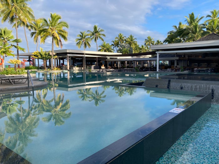 Sheraton Fiji Golf and Beach Resort pool at sunrise Sheraton Fiji Golf and Beach Resort pool at sunrise