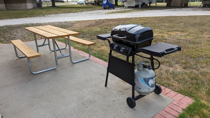 Thousand Trails Colorado River cabin outdoor porch with picnic table and propane grill