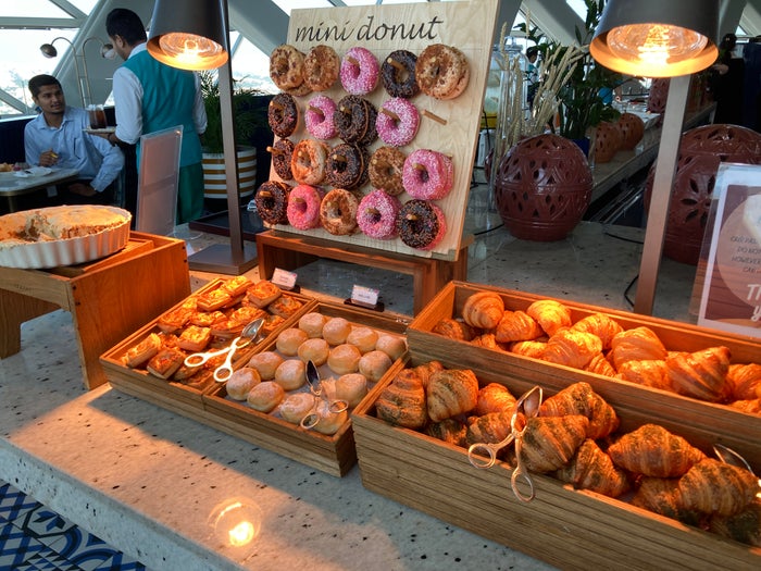 Andaz Capital Gate Abu Dhabi Cyan breakfast donut wall Andaz Capital Gate Abu Dhabi Cyan breakfast donut wall