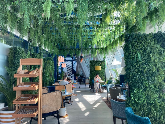 Andaz Capital Gate Abu Dhabi Cyan breakfast green dining area Andaz Capital Gate Abu Dhabi Cyan breakfast green dining area