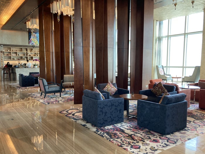 Andaz Capital Gate Abu Dhabi lobby seating check in Andaz Capital Gate Abu Dhabi lobby seating check in