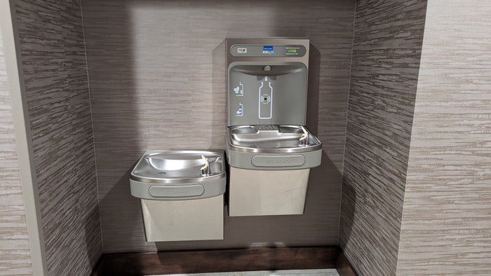 Hampton Inn and Suites Aurora South Denver amenities fitness center hallway water fountain Hampton Inn and Suites Aurora South Denver amenities fitness center hallway water fountain