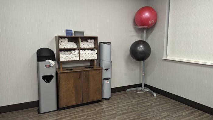 Hampton Inn and Suites Aurora South Denver amenities fitness center towels water and balance balls Hampton Inn and Suites Aurora South Denver amenities fitness center towels water and balance balls