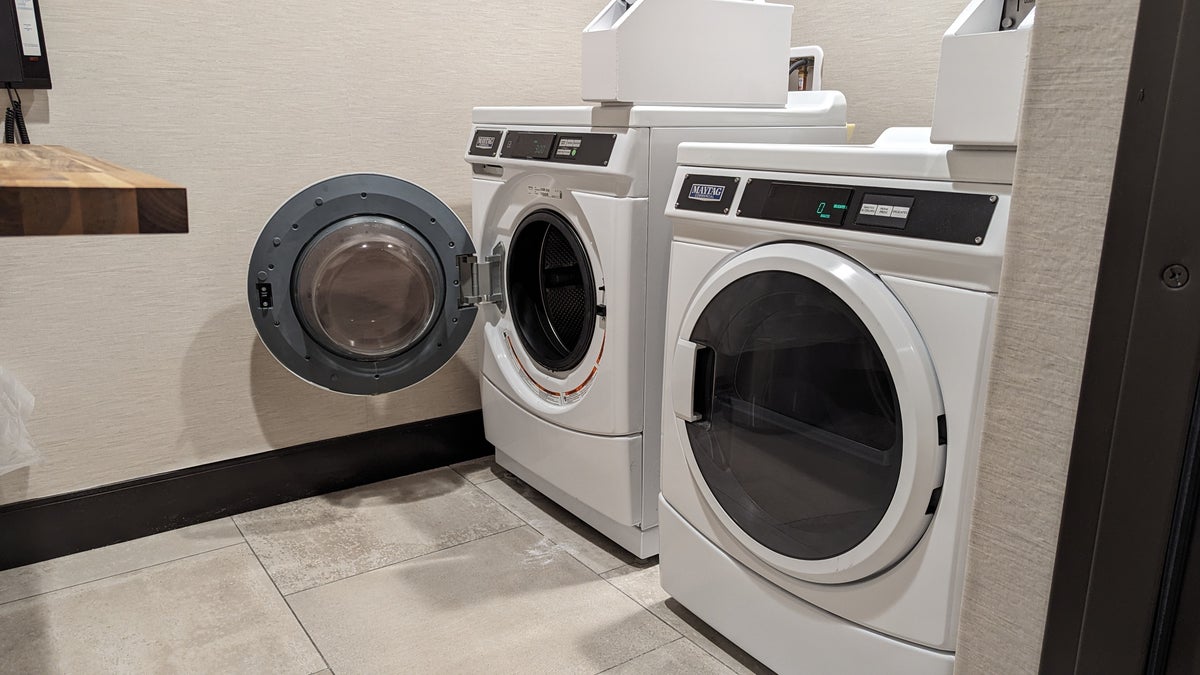 Hampton Inn and Suites Aurora South Denver amenities laundry washers